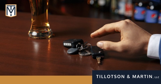 grabbing keys next to beer