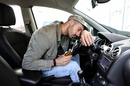 A military veteran asleep and drunk in their car