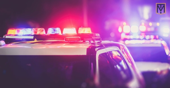 police vehicles with lights on