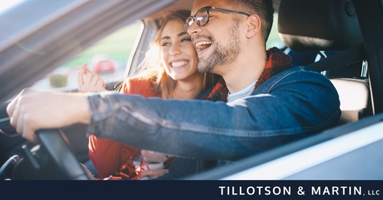 couple happy driving in the car