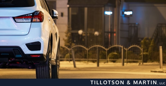 white car parked at night